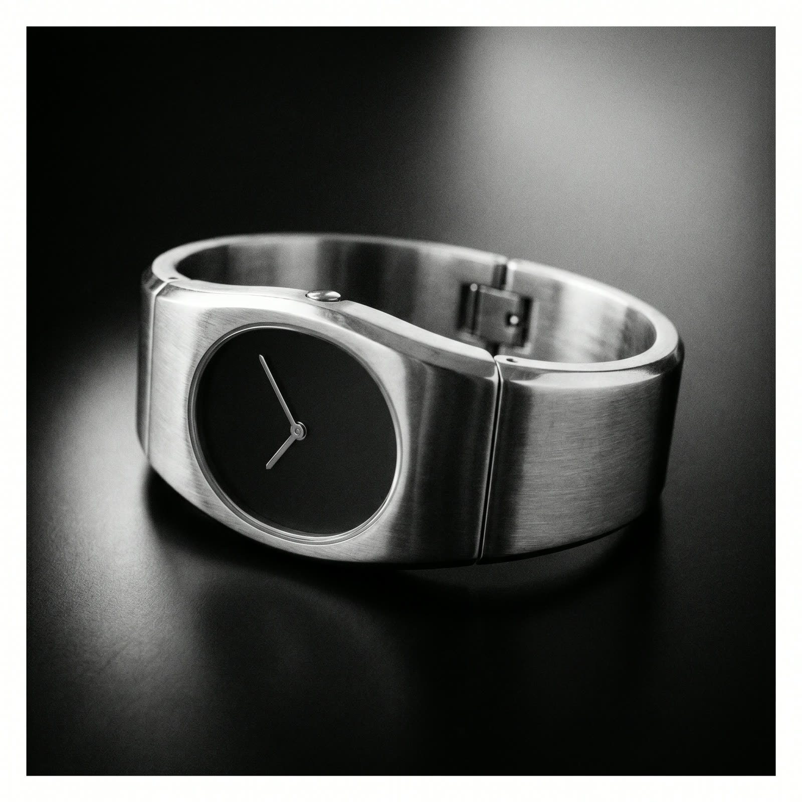 The watch — stopped hands. Time as a prop